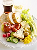 A ploughmans lunch with a glass of beer (England)