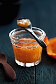 A jar of cold-stirred persimmon jam