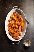 Glazed carrots in a serving dish