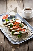 Chicken with coconut sauce, lemongrass and coriander on a bed of rice (Asia)