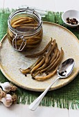 Pickled green beans with garlic and pepper