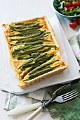 Green bean quiche, partly sliced