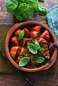 Gratinated tomatoes with anchovies and breadcrumbs