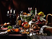 An autumnal arrangement with pumpkin, grapes and wine