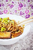 Ramen noodles with smoked tofu and spring onions (Asia)