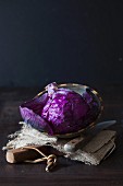 Fresh red cabbage in a wooden bowl