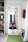 Child sitting on ride-on toy