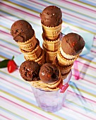 Chocolate ice cream in ice cream cones sprinkled with chilli powder
