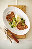 Venison escalope with celery purees and glazed Brussels sprouts