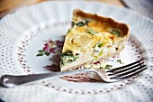A slice of cheddar and leek quiche