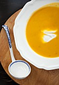 Pumpkin soup with creme fraiche (detail)