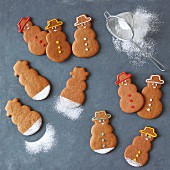 Gingerbread snowmen with icing sugar