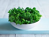 Green kale in a white bowl