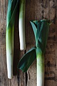 Leeks on a wooden surface