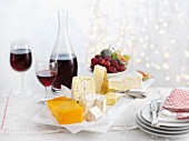 A cheese platter with wine