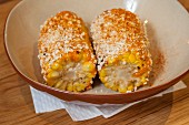 Roasted corn on the cob with cheese