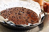 Melted chocolate cake in a tart tin
