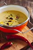 Cream of sweetcorn soup with kidney beans and chilli peppers
