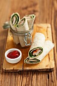 Tortilla wraps with spinach and smoked chicken breast