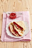 Pancakes with cream cheese and strawberries