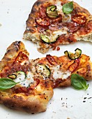 Pizza topped with courgette and dried tomatoes