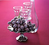 Iced grapes in a silver dish