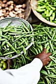 Peas and ginger at a market in Mumbai, India