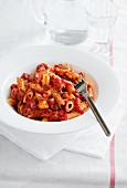 Penne all'arrabbiata (pasta with spicy sauce, Italy)