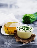 Lime dressing and chive dressing in bowls