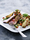 Duck breast with potato wedges and couscous (Morocco)