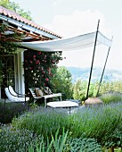 Seating area on terrace below awning