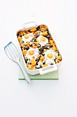 Gnocchi bake with spinach and fried egg