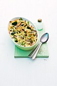 Spätzle (soft egg noodles from Swabia) and vegetable bake with ham and cheese