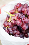 Red grapes in a plastic bag (close-up)