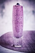 A blueberry smoothie in a glass