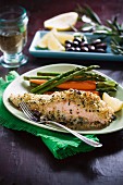 Gratinated salmon fillets with a couscous crust and a side of vegetables