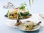Spicy cream cheese cake with olives and herbs