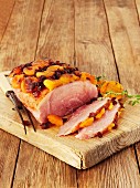 Roast pork with apricots, cranberries and thyme