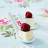 Panna cotta as spoon canapés with raspberries