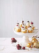 Profiteroles with cherries for Christmas