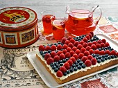 A Union Jack cake with fresh berries