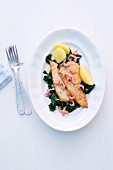Plaice fillets with shrimps and spinach