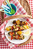 Grilled salmon and vegetable skewers for a picnic