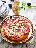 Plum cake with flaked almonds