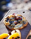 A winter pizza with pears, blue cheese and red onions