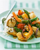 Prawn and vegetable stir fry with a side of rice