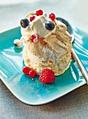 Meringue with ice cream, whipped cream and berries