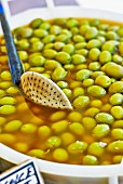 Preserved green olives at a market