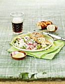 Turkey steaks in a beer marinade with a radish salad