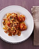 Iberian pork steak with stuffed tomatoes